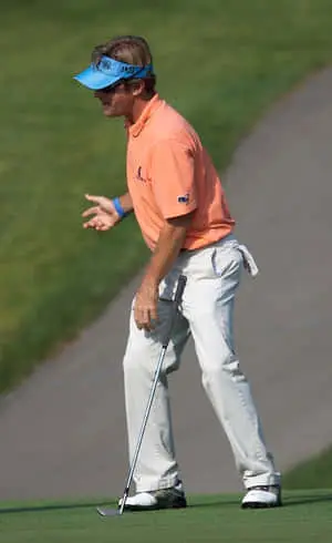  Caption: Professional Golfer Brett Quigley Focused on the Course 