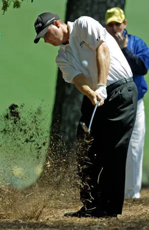 Chad Campbell Hitting Ball With Grass 