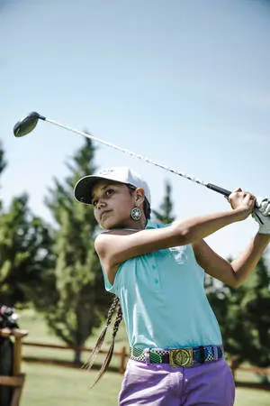 Girl Swinging A Club Golf Phone