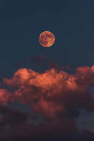 Beautiful Orange Moon And Clouds iPhone Background
