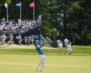 Jon Rahm With His Golf Club