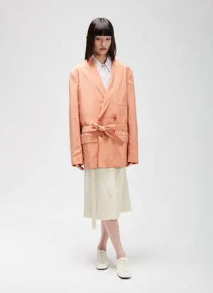  Caption: Classy Lemaire Double-Breasted Coat 