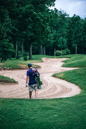 Man Walking Golf Phone