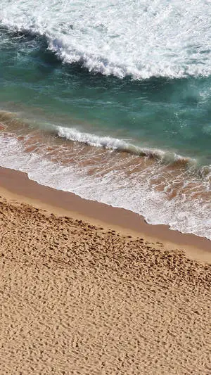 Enjoy the tranquility of the ocean crashing onto the shore
