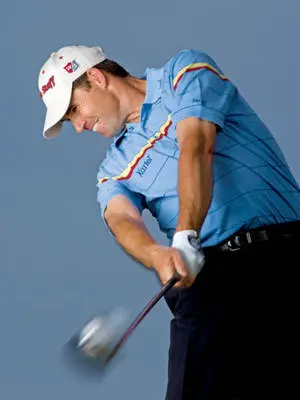 Padraig Harrington Smiling And Swinging
