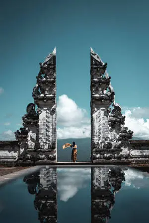 Woman Standing At Hindu Temple