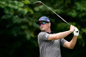 Zach Johnson Swinging A Black Club